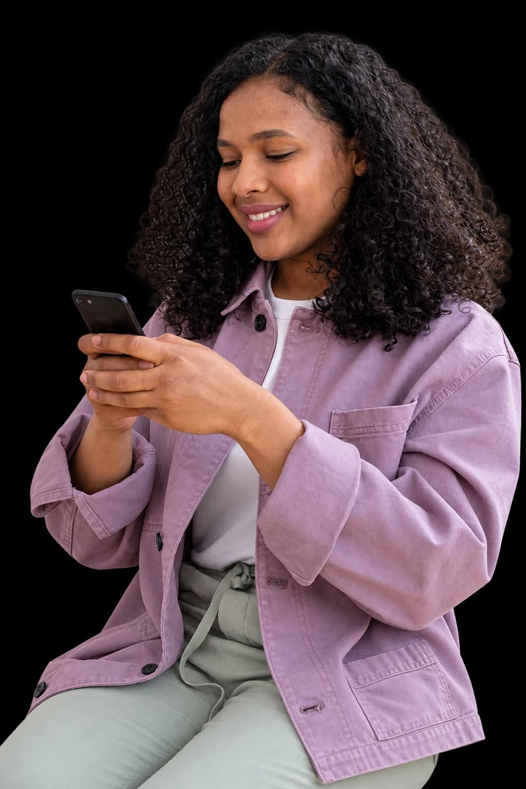 A woman looking relaxed at her smartphone.